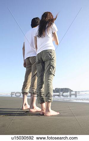 Stock Image - Japanese couple in Enoshima. Fotosearch