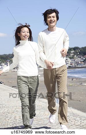 Japanese couple in Enoshima View Large Photo Image Stock Photo - Japanese couple in Enoshima. Fotosearch