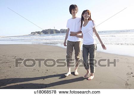 Stock Photo - Japanese couple in Enoshima. Fotosearch