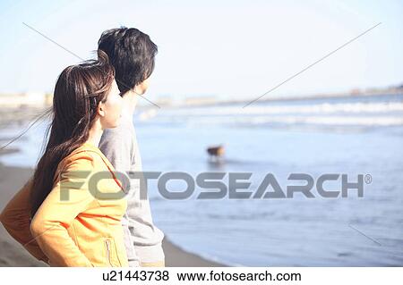 Stock Photo - Japanese couple in Enoshima. Fotosearch
