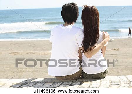 Stock Photograph - Japanese couple in Shonan area. Fotosearch