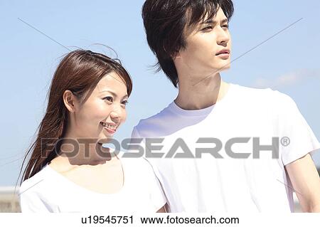 Stock Image - Japanese couple in Shonan area. Fotosearch