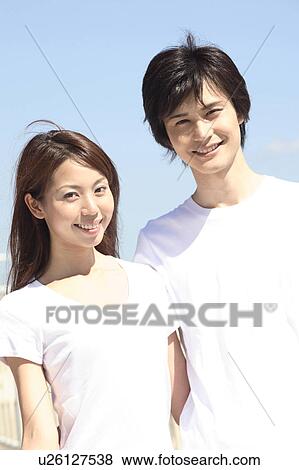Stock Photo - Japanese couple in Shonan area. Fotosearch