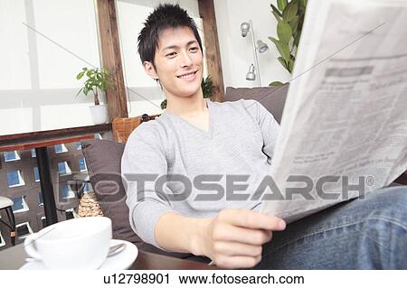 Japanese man reading a newspaper View Large Photo Image Stock Image - Japanese man reading a newspaper. Fotosearch
