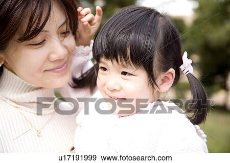 Stock Photo - Mather and daughter. Fotosearch