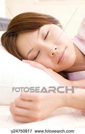 Sleeping face of Japanese woman View Large Photo Image Stock Photo - Sleeping face of Japanese woman. Fotosearch
