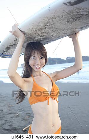 Japanese surfer in Enoshima beach View Large Photo Image Stock Image - Japanese surfer in Enoshima beach. Fotosearch