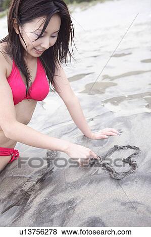 Japanese woman in swimsuit View Large Photo Image Stock Photo - Japanese woman in swimsuit. Fotosearch