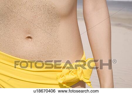 Stock Photograph - Waist of Japanese woman in swimsuit. Fotosearch