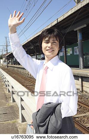 Businessman waving View Large Photo Image Stock Photography - Businessman waving. Fotosearch