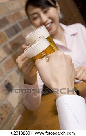 Hand having a beer mug View Large Photo Image Stock Photo - Hand having a beer mug. Fotosearch