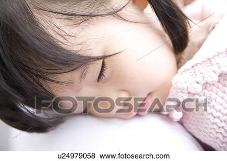 Stock Photo - Sleeping girl. Fotosearch