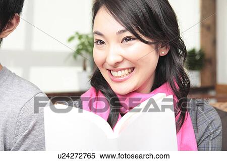 Stock Photography - Woman reading a book. Fotosearch