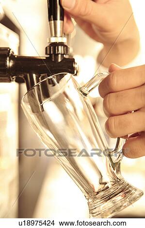 Picture - Beer server. Fotosearch