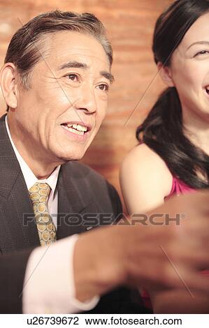 Stock Image - Portrait of Japanese executive. Fotosearch