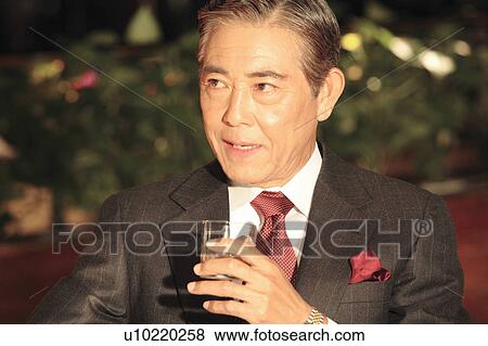 Stock Photo - Portrait of Japanese executive. Fotosearch
