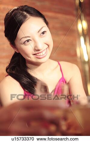 Stock Image - Portrait of Japanese hostess. Fotosearch