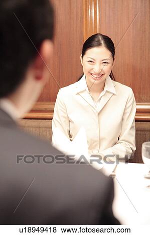 Stock Photo - Smiling office lady. Fotosearch
