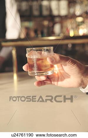 Stock Image - Whiskey glass. Fotosearch