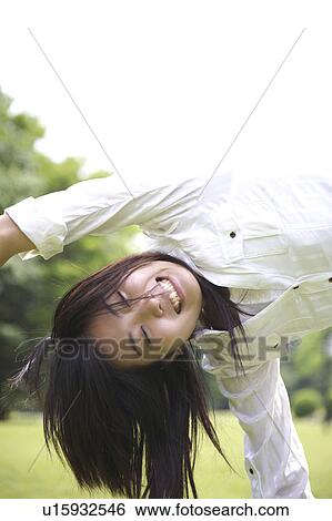 Stock Photograph - Smiling Japanese woman. Fotosearch