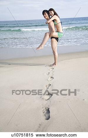 Stock Photography - Footprint left in a sandy beach. Fotosearch