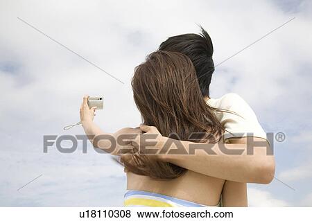 Japanese couple shooting photo View Large Photo Image Stock Photo - Japanese couple shooting photo. Fotosearch