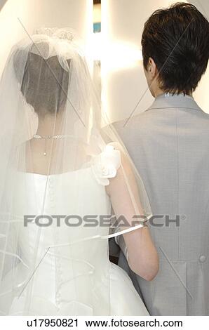 Back figure of bridal couple View Large Photo Image Stock Image - Back figure of bridal couple. Fotosearch
