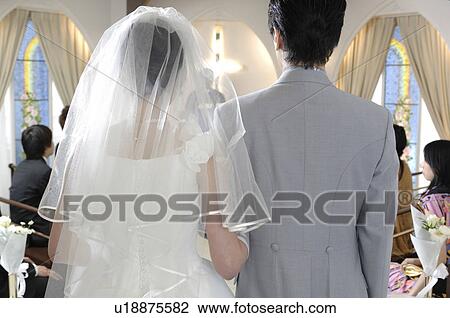 Back figure of bridal couple View Large Photo Image Stock Image - Back figure of bridal couple. Fotosearch