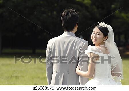 Back figure of bridal couple View Large Photo Image Stock Photography - Back figure of bridal couple. Fotosearch