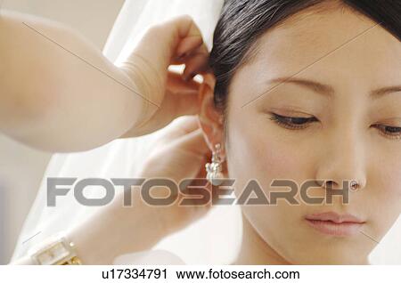 Bride setting hair View Large Photo Image Stock Image - Bride setting hair. Fotosearch