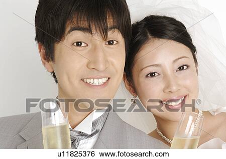 Smiling bridal couple View Large Photo Image Stock Photograph - Smiling bridal couple. Fotosearch