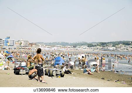 Crowd of Japanese people in the beach View Large Photo Image Stock Photograph - Crowd of Japanese people in the beach. Fotosearch