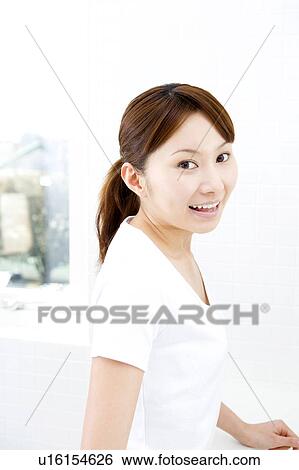 Stock Photograph - Portrait of woman. Fotosearch