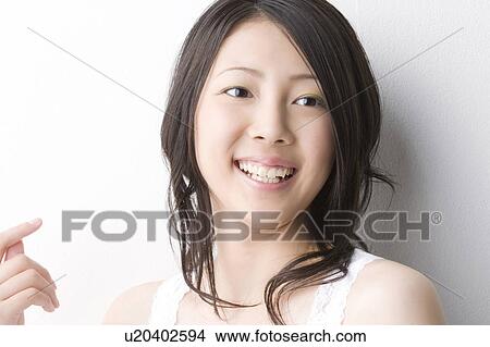 Portrait of young woman View Large Photo Image Picture - Portrait of young woman. Fotosearch