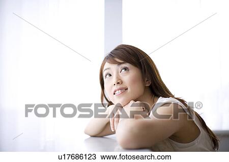 Stock Image - Portrait of young woman. Fotosearch