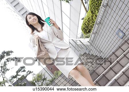 Picture - Business lady walking . Fotosearch