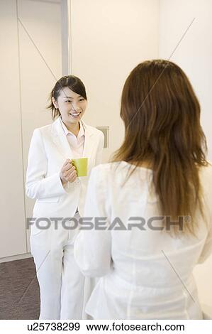 Stock Photo - Coworkers. Fotosearch