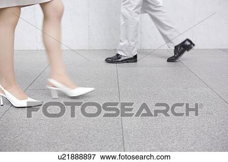 Feet of office workers View Large Photo Image Stock Photo - Feet of office workers. Fotosearch