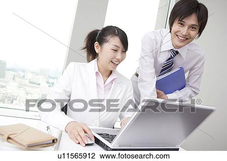 Office coworkers View Large Photo Image Stock Image - Office coworkers. Fotosearch