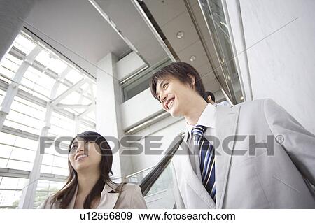 Office workers smiling View Large Photo Image Stock Photo - Office workers smiling. Fotosearch