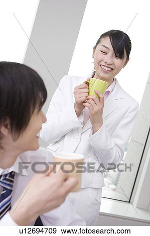 Office workers taking a coffee break View Large Photo Image Stock Photo - Office workers taking a coffee break . Fotosearch