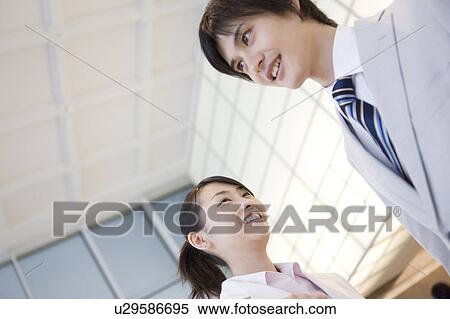 Smiling office workers View Large Photo Image Stock Photography - Smiling office workers. Fotosearch