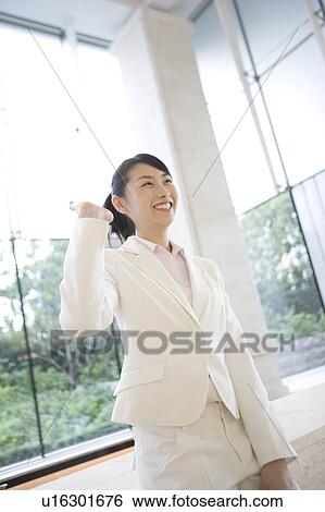 Woman waving a hand View Large Photo Image Stock Photograph - Woman waving a hand. Fotosearch