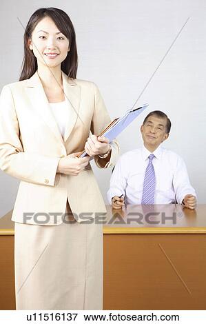Stock Photo - Businessman and businesswoman. Fotosearch