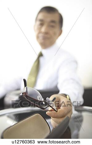 Stock Image - Japanese chief executive officer. Fotosearch
