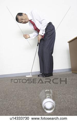 Japanese chief executive officer practicing golf View Large Photo Image Stock Image - Japanese chief executive officer practicing golf. Fotosearch