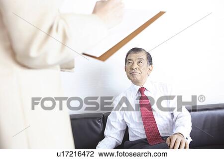 Stock Image - Japanese chief executive officer. Fotosearch
