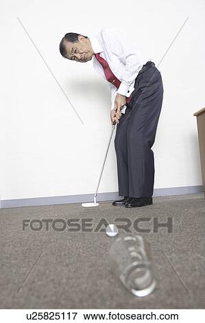 Japanese chief executive officer practicing golf View Large Photo Image Stock Photo - Japanese chief executive officer practicing golf. Fotosearch