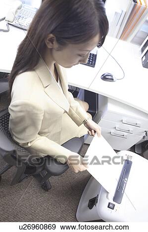 Office lady shredding papers View Large Photo Image Stock Photo - Office lady shredding papers. Fotosearch