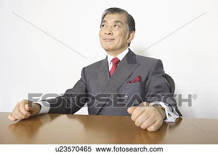 Stock Photography - Smiling businessman. Fotosearch